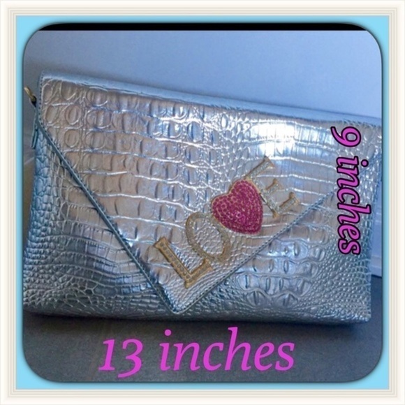 KISS Metallic Clutch, Wristlet, or C-Body. - Picture 2 of 5